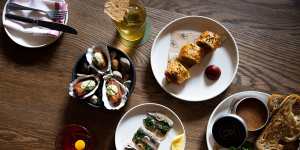 Hot smoked sardines,lamb sausage roll;Southern-style fried oysters and potted pig rillettes.