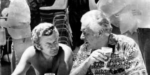 Bob Hawke and Gough Whitlam enjoy a poolside beer at the ALP Conference,Terrigal,1975. 