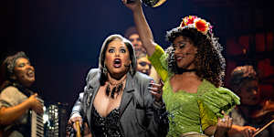 Christine Anu as Hermes and Elenoa Rokobaro as Persephone in a scene from Opera Australia’s Hadestown,now playing in Melbourne.