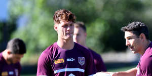 Billy Slater gives Kalyn Ponga some pointers in Maroons camp in 2019. 