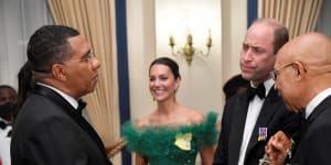 From left,Jamaican Prime Minister Andrew Holness,Catherine - the Duchess of Cambridge - Prince William and Governor-General of Jamaica Patrick Allen speak during a dinner at King’s House in Kingston.
