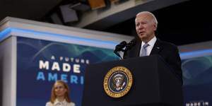 US President Joe Biden speaking on American manufacturing in Washington alongside Tritium chief executive Jane Hunter in 2022.