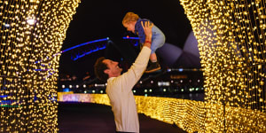 Father and son at the cathedral of light installation in the Royal Botanic Garden as part of Vivid Sydney in 2016.