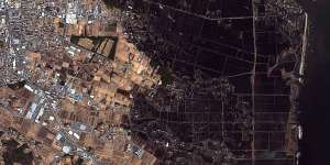 A satellite image of the damage inland of Minamisoma in Fukushima,taken on March 12,2011.