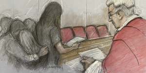 A court artist’s drawing of the parent of one of Letby’s victims reading a victim impact statement in court.