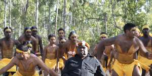 Yunupingu with traditional dancers at the 2019 Garma festival. 