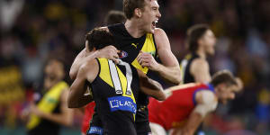 Tom Lynch celebrates the win over the Lions.