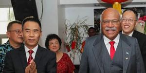 Zhao Fugang (left) with Fijian Prime Minister Sitiveni Rabuka at a festival in 2023.