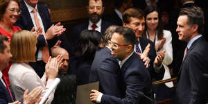 NSW Treasurer Daniel Mookhey is congratulated by his Labor colleagues after delivering the 2023-24 NSW state budget.