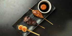 A platter with tsukune (chicken meatball),wagyu and scallop skewers at Robata.