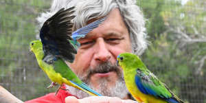 Michael Johnson owns Moonlit Sanctuary wildlife park,the only privately-owned zoo to breed the orange-bellied parrot.