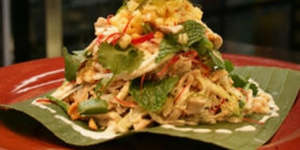 Coconut-grilled chicken with green mango salad and chilli jam