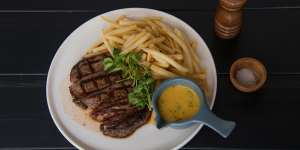 Go-to dish:Grain-fed scotch fillet with shoestring fries,bearnaise and red wine jus.