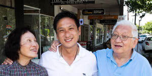 Jason Yat-sen Li,who is likely to win the seat of Strathfield when the result is declared,with his proud parents Pansy and George. 