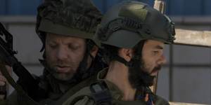 Israeli soldiers are seen during an army operation,in the Jenin refugee camp,West Bank.