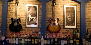 Music legends on the wall at Buddy Guy Legends in Chicago.