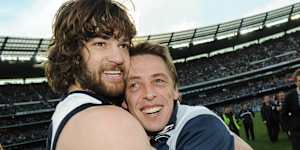 Max Rooke and former Cats coach Mark Thompson after the 2009 AFL grand final.