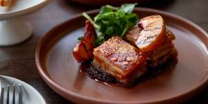 Pork belly with mole,grilled drunk peaches and mezcal molasses.