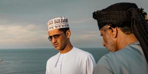 Locals visit Muscat Anchorage in Oman near the Strait of Hormuz on March 30.