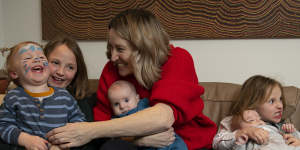 Jana Pittman with her children,from left,Charlie,Emily,twins Quinlan and Willow and Jemima,at home in Beecroft. 