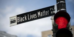 A newly installed street sign designates Black Lives Matter Plaza NW in Washington,DC.
