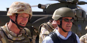 Paul Symon with then-Defence minister Brendan Nelson in southern Iraq in 2006. 