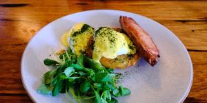 The bacon benedict stars thick cut,properly sizzled bacon and poached eggs over golden potato rosti. 