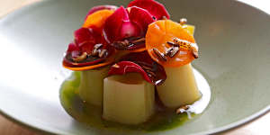 Leeks topped with a colourful carrot halo.