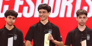 The teen winners of the Olympic esports shooting event take the podium in Singapore:silver winner Alexander “Boltz” Feyzjou (left),champion Lucas “anon” Malissa and bronze winner Andrej “Merstach” Piratov. 