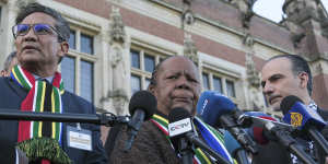 South Africa’s Foreign Minister Naledi Pandor,centre,addresses reporters after the World Court session.