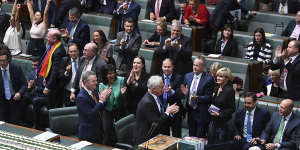 Turnbull and fellow Coalition MPs applaud as the House of Representatives votes to legalise same-sex marriage on December 7,2017. 
