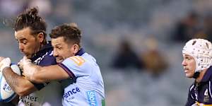 CANBERRA,AUSTRALIA - MARCH 27:Andy Muirhead of the Brumbies is tackled during the round seven Super Rugby match between ACT Brumbies and NSW Waratahs at GIO Stadium,on March 27,2026,in Canberra,Australia. (Photo by Mark Nolan/Getty Images)