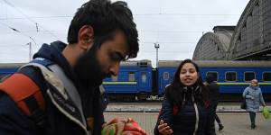 Indian medical students Sagar Arora (left) and Kajal Rauniyar at Lviv railway station.