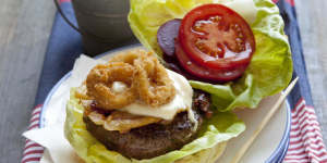 Surf and turf burger with crumbed calamari.