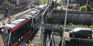 Light rail tram and car collide in inner Sydney