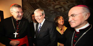 In 2010,then-Foreign Minister Kevin Rudd meets Cardinal George Pell and Cardinal Vigano at an event in Rome.