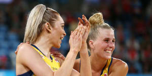 Helen Housby (left) and Maddy Turner celebrate victory against the Magpies.