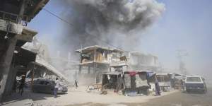 Smoke rises following Israeli bombardments in Khan Younis,Gaza Strip,on Monday.