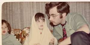 The author as a child in Canada in 1976 with her father,David.
