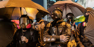Protesters form a front line during a stand-off with police in December 2019. 