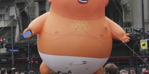 Protesters joined by'baby Trump'blimp as they converge on the streets of Buenos Aires against G20 summit