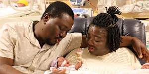 Belinda and Emmanuel with two of their four newborns.