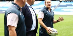 Wallaroos head coach Jay Tregonning,Rugby Australia chief executive Andy Marinos and Shannon Parry speak after Parry announced her retirement.