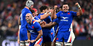 French players celebrate after their victory.