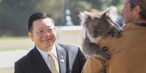 Dr Kao Kim Hourn,Secretary-General of ASEAN,meets a koala at Government House.