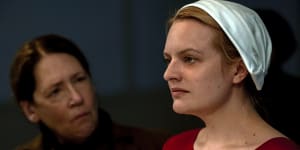 Ann Dowd and Elisabeth Moss in a scene from The Handmaid’s Tale.