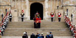 The coffin is carried into St George’s Chapel.