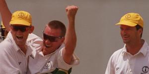 Australia’s Brad Young (centre) celebrates with Adam Gilchrist and Steve Waugh after taking a hat-trick in the semi-final at the 1998 Commonwealth Games.
