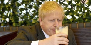 British PM Boris Johnson having a beer.