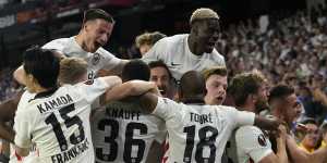 Eintracht Frankfurt players celebrate a first European title in more than 40 years.